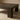 Dark wooden coffee table on a beige background